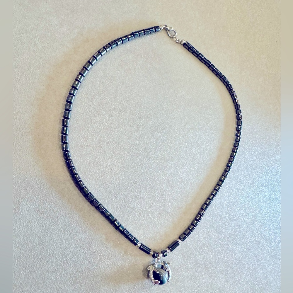 Hematite dark grey beaded necklace with dolphin pendant